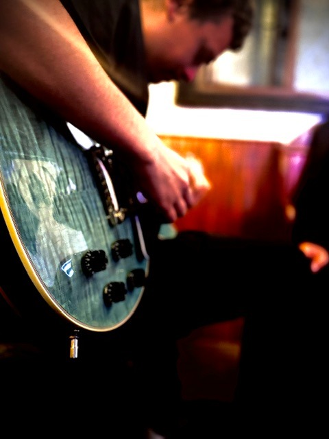 Guitar set up and being played